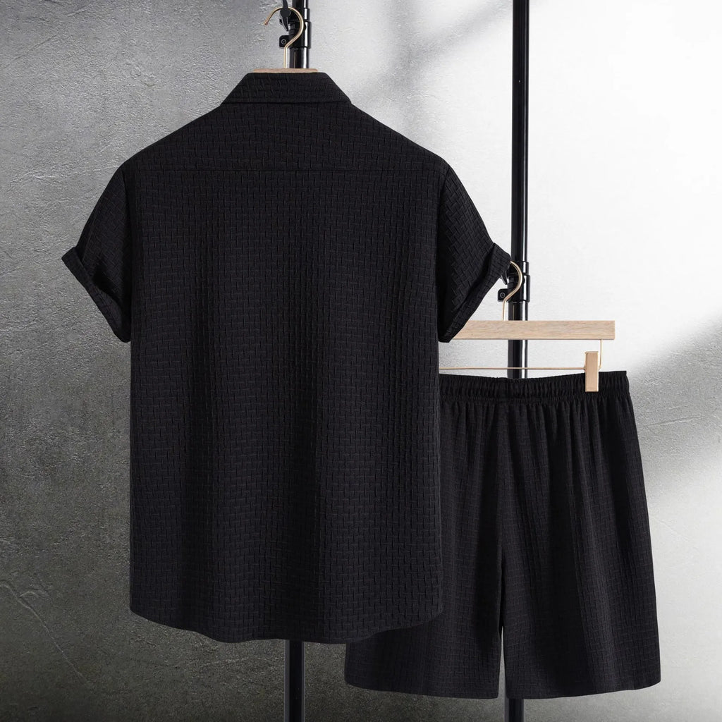 Men's loose fit cotton blend short sleeve shirt and shorts set in white, laid out flat.