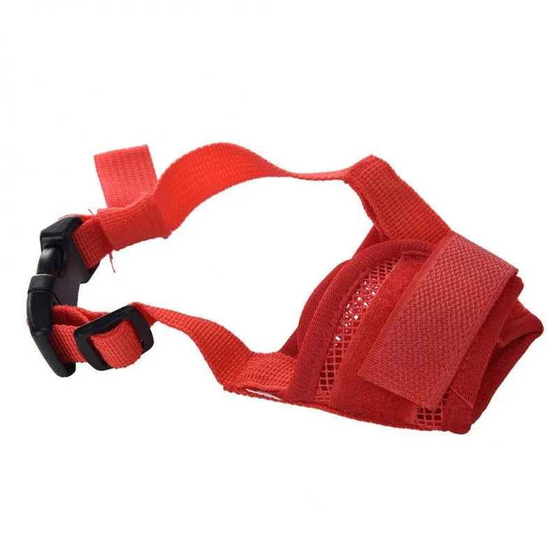 Adjustable plastic dog muzzle in black, shown on a size chart with measurements.