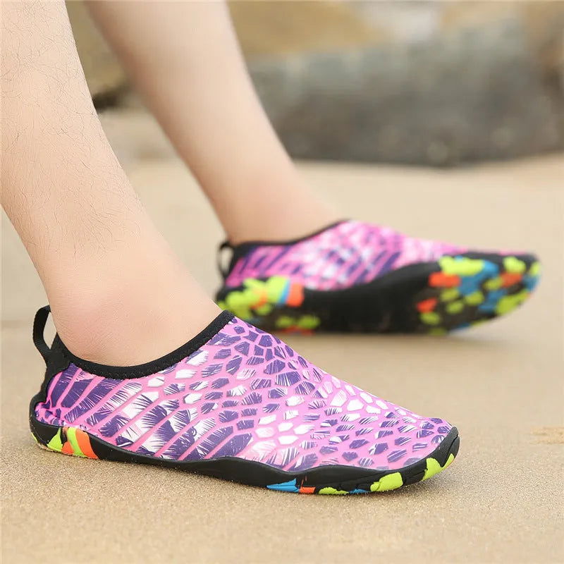 Blue Lycra beach wading shoes with elastic upper and lightweight EVA sole for swimming.