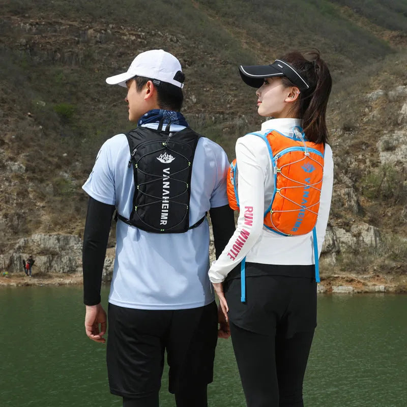 Ultra-light cross-country outdoor backpack in Streamer Orange colour with waterproof fabric.