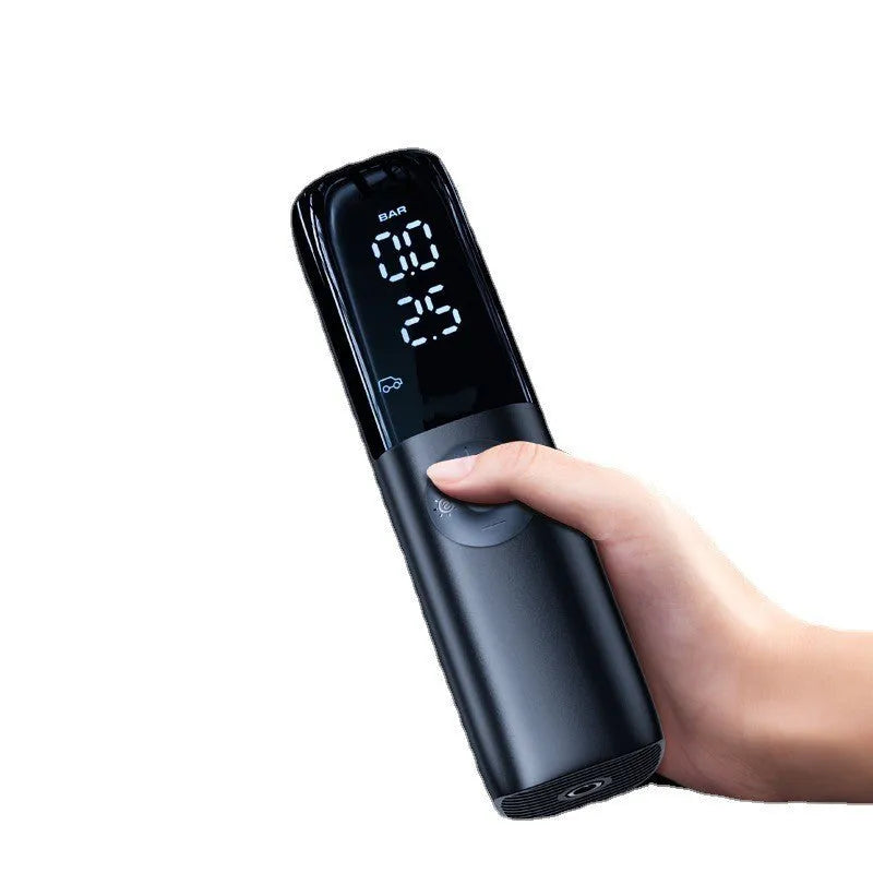 Black portable electric car air pump with plug-in connector and tyre pressure gauge