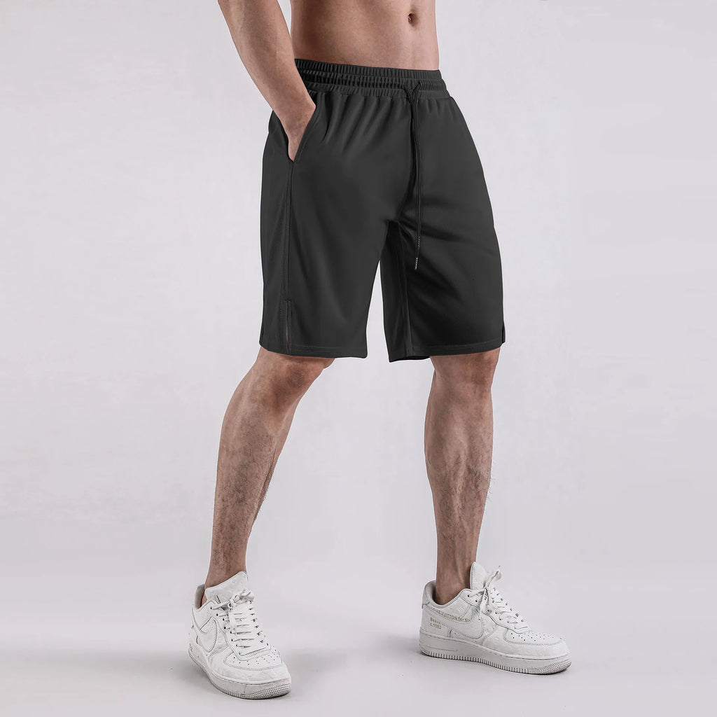 Men's black quick-drying mesh casual shorts with elastic waistband on a neutral background