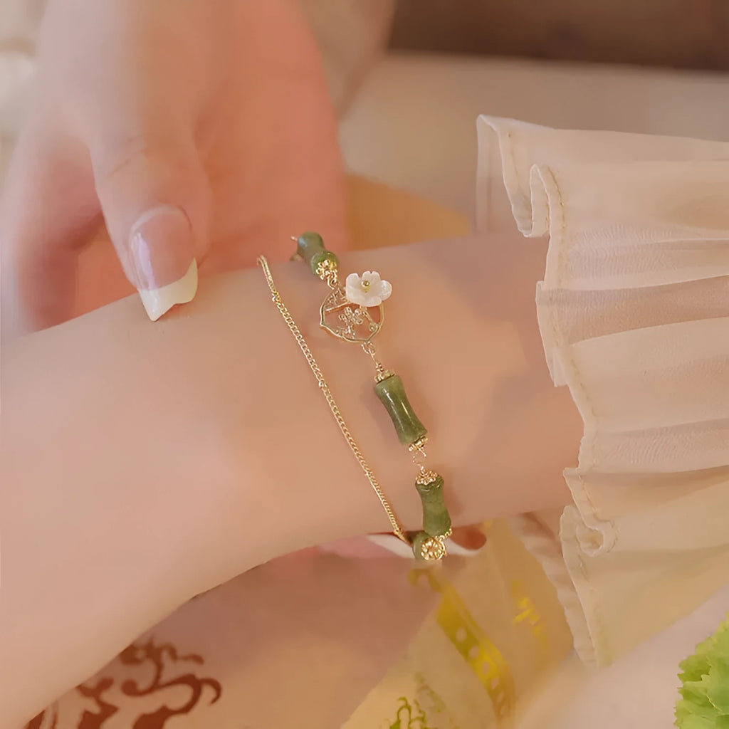 Natural green Olivine double layer bracelet with Twin Bells of Ireland and Olive Branch charms.