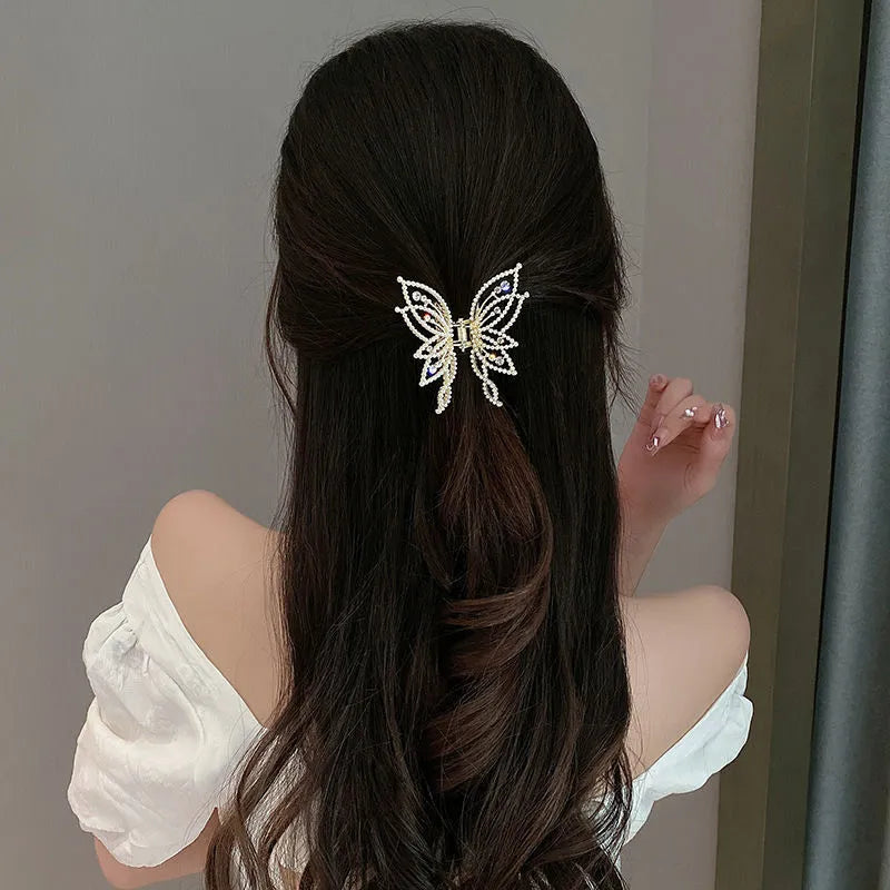 Butterfly hair barrettes for women in alloy metal with rhinestone or pearl style finishes