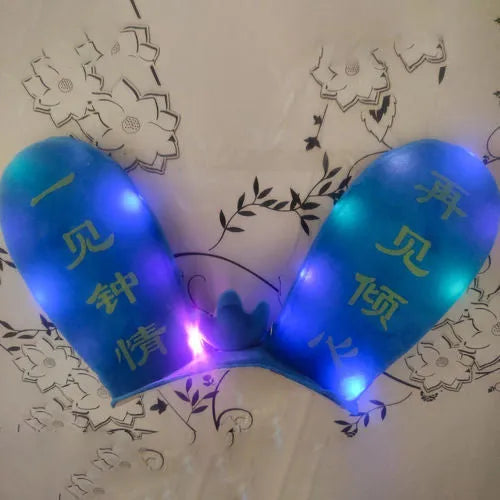 Rabbit Glow Ears helmet decoration with locomotive and ski designs on a Velcro base
