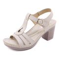 Women's patent leather sandals with thick heel and metal buckle in black colour