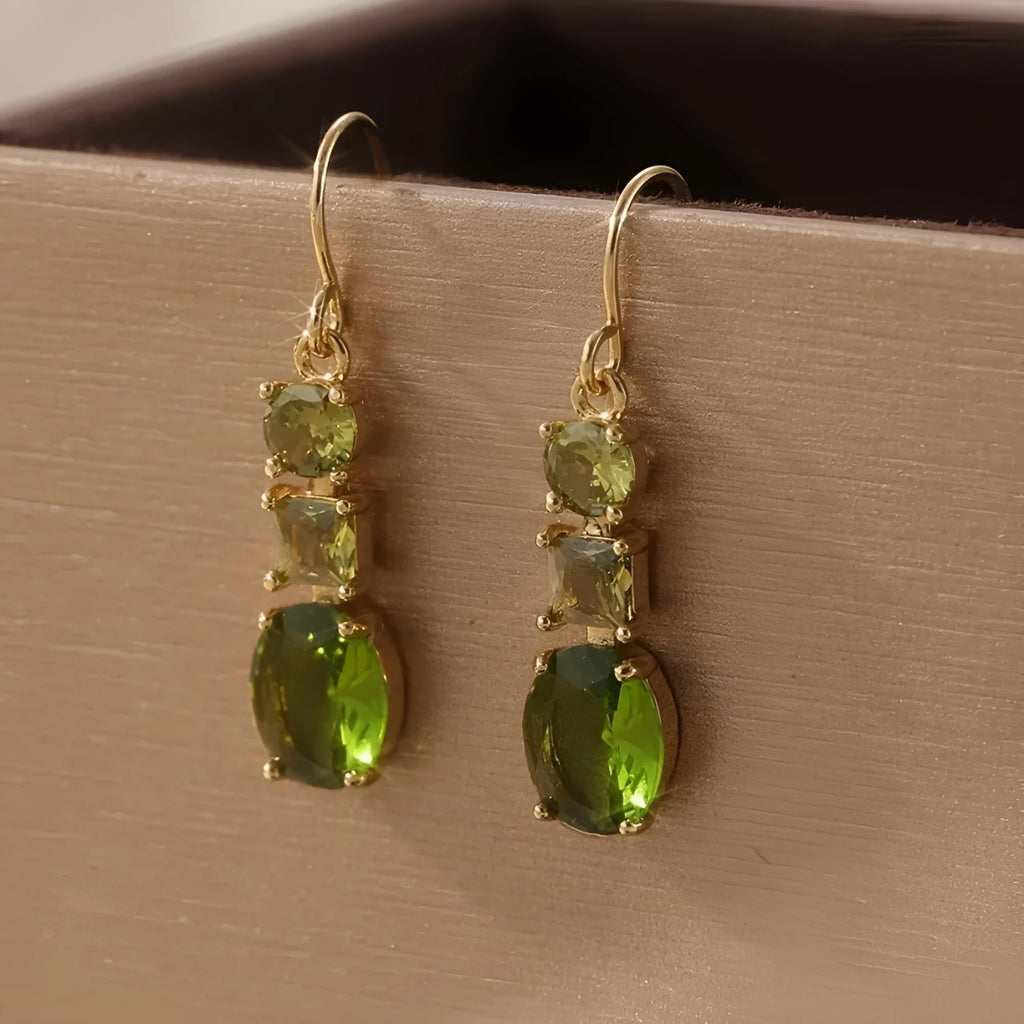 A pair of green geometric copper earrings with a quadrilateral shape in a retro bohemian style.