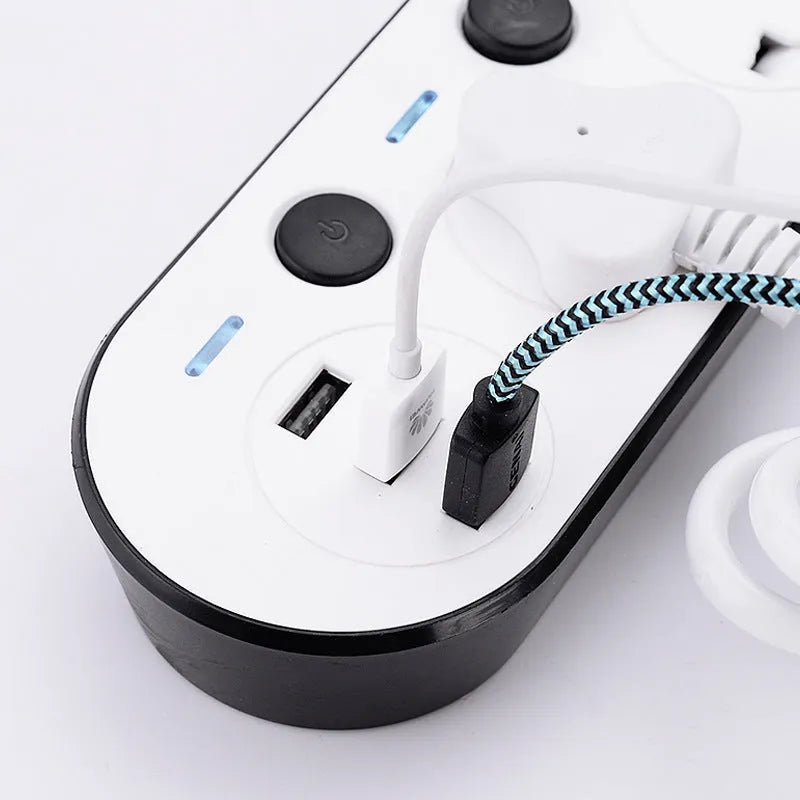 International power strip with sockets for UK, US, EU and AU plugs, a switch, and USB ports.