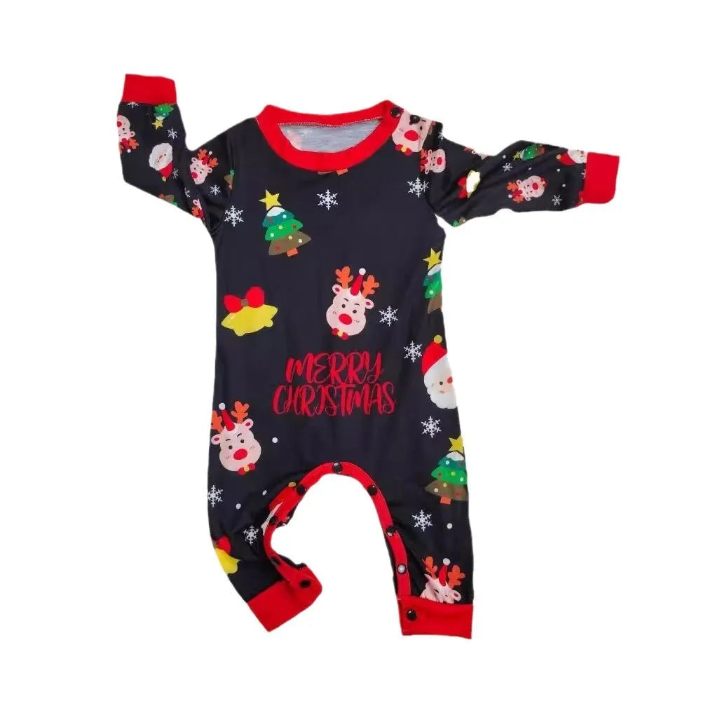 Family wearing matching Christmas pajamas with plaid design, including adults, children and dog in coordinated sleepwear