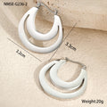 Geometric minimalist French earrings in gold or steel finish with round ring design elements