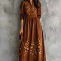 Brown vintage-style midi dress with floral embroidery and suede texture