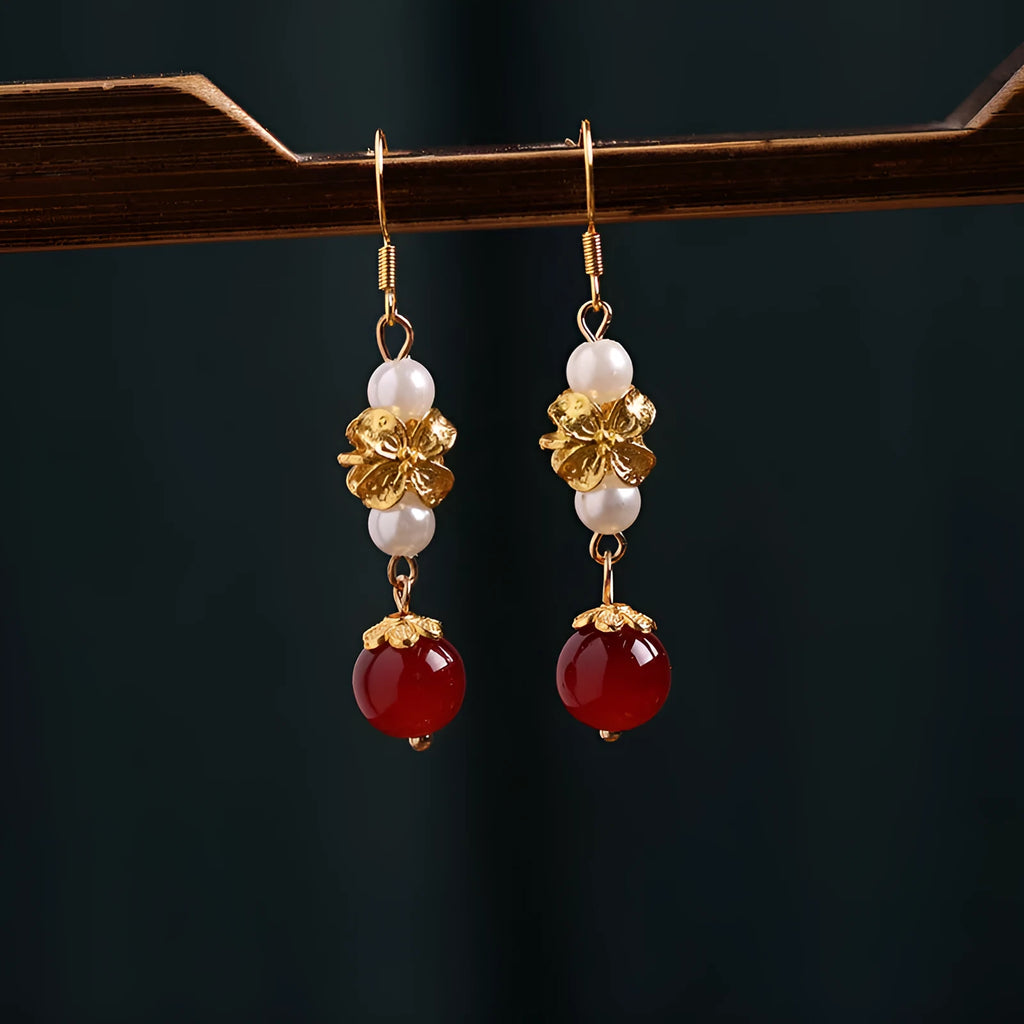Gold electroplated alloy geometric earrings with vintage Chinese court style design