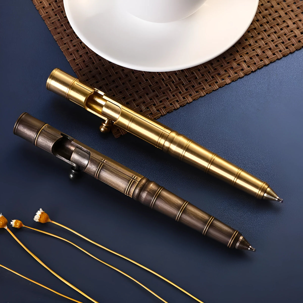 Retro brass tactical press pen with machine gun styling and solid brass construction
