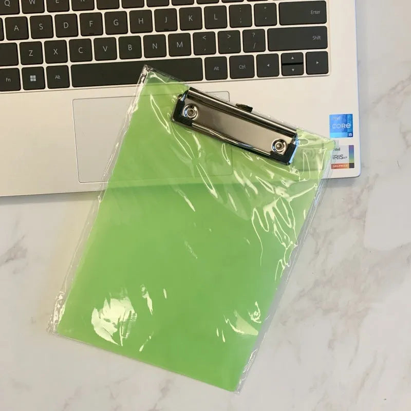 Transparent A4 clipboard with metal flat clip holding paper, shown in blue colour option.