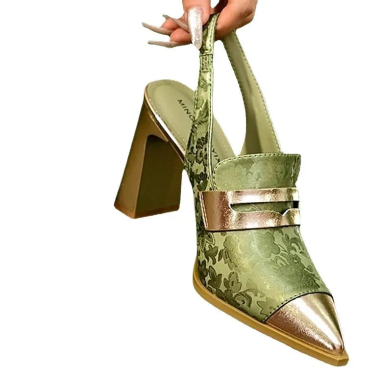 Black women's high-heel sandals with a chunky heel, pointed toe, and a single elasticated ankle strap.