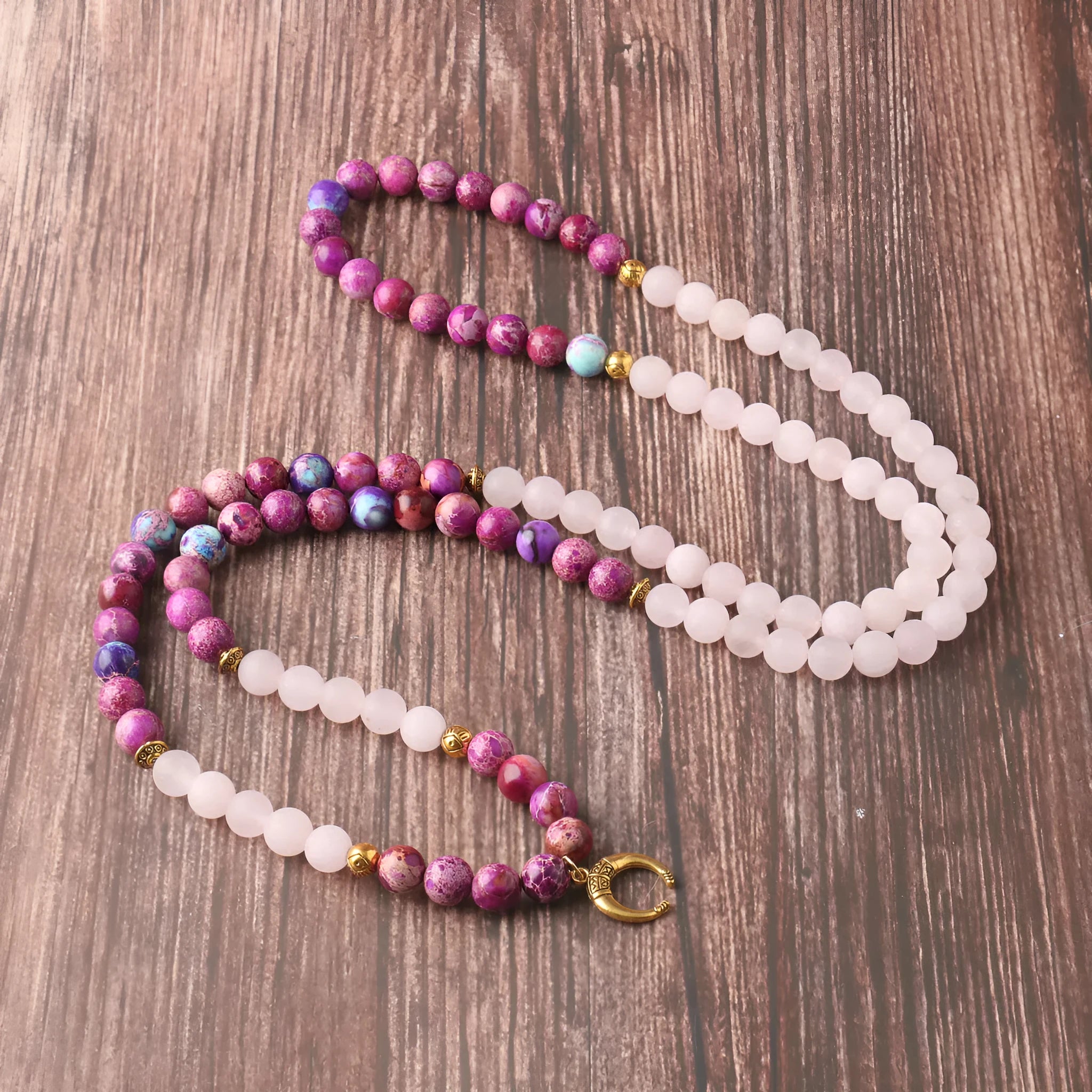 Round pendant necklace with pink crystal emperor stone and personalised bead design on chain
