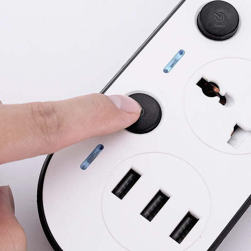 International power strip with sockets for UK, US, EU and AU plugs, a switch, and USB ports.