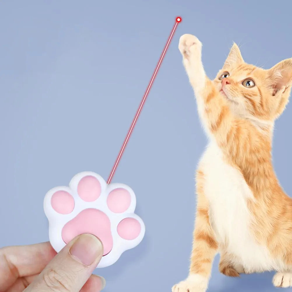 Compact pink and black USB rechargeable infrared cat teaser toy with keychain attachment