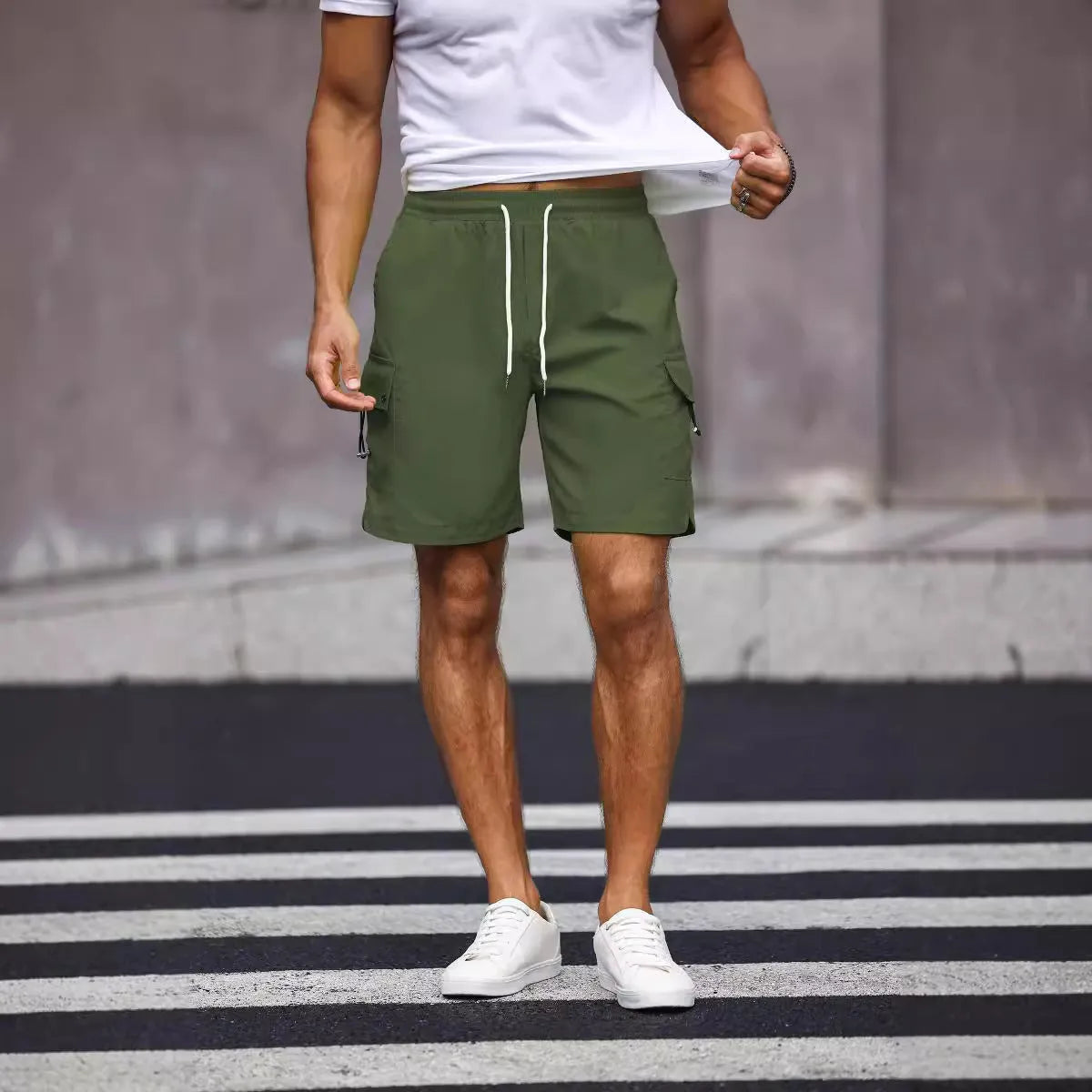 Men's loose fit street style work shorts in fluorescent green and army green colours.