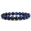 Natural tigereye crystal beaded bracelet with round beads, shown in a selection of colours and sizes on a wrist.