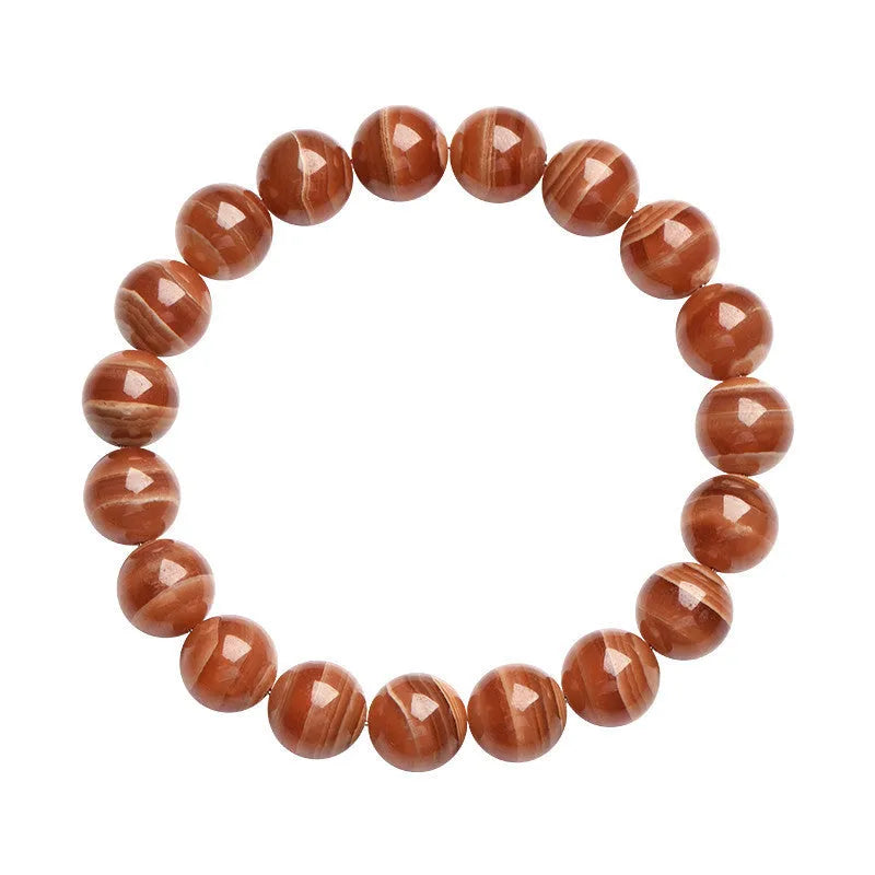 Peruvian Old Mine Rhodochrosite bracelet with geometric design and round beads
