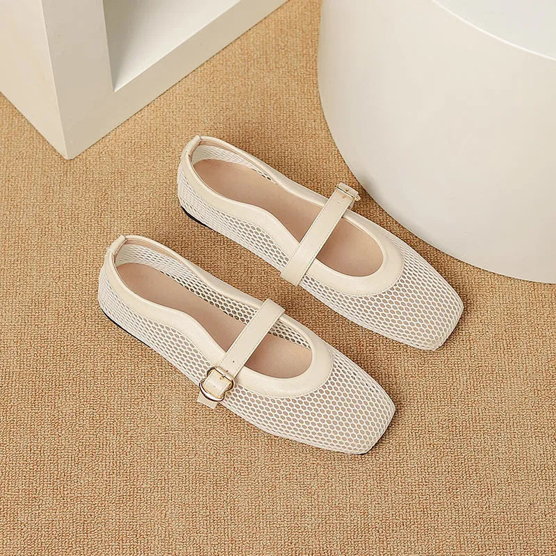 Women's low heel mesh pump in beige with a buckle strap and square toe.