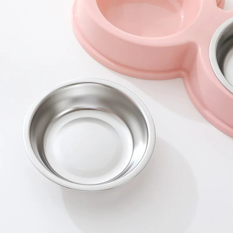 Blue frog-shaped pet double bowl with two stainless steel compartments for food and water