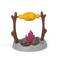 Barbecue-style plastic cat tumbling food feeder toy with multiple openings for treat dispensing