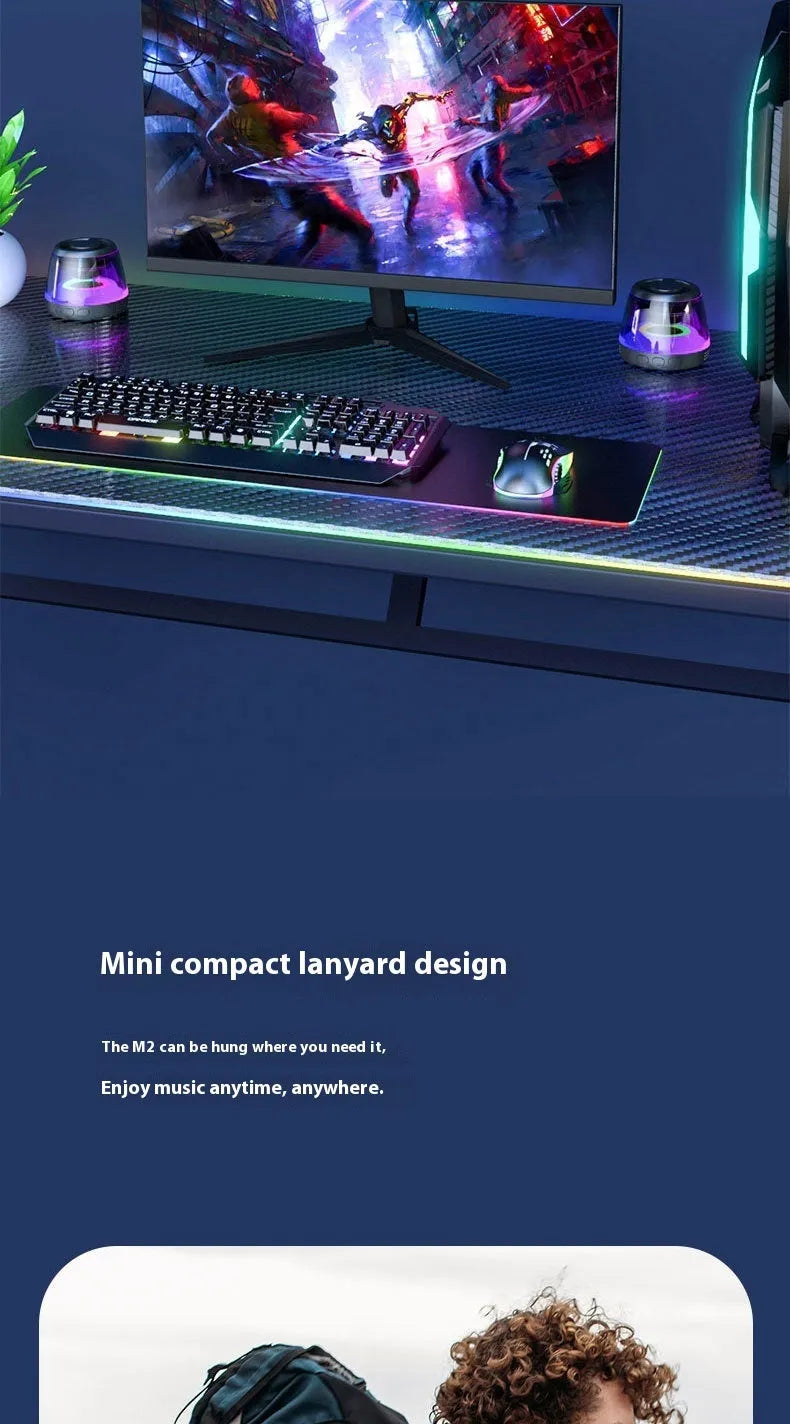 Compact white Bluetooth speaker with LED light on a magnetic base.