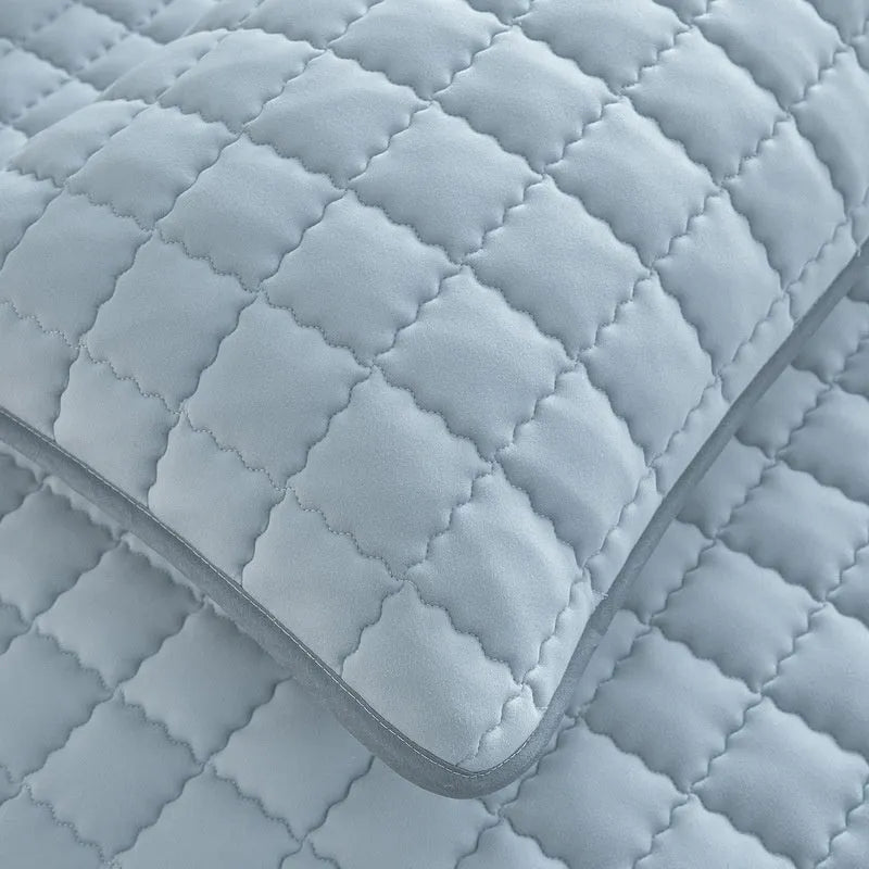 Class A waterproof washed cotton fitted bed sheet shown in light grey, fitted over a mattress.