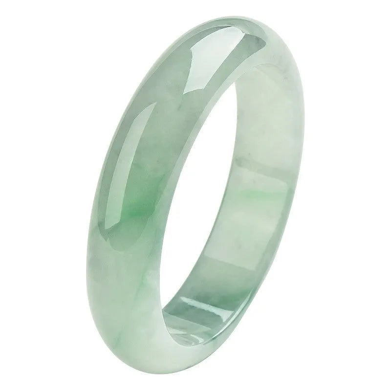 Light green jade bracelet with natural style design on wrist