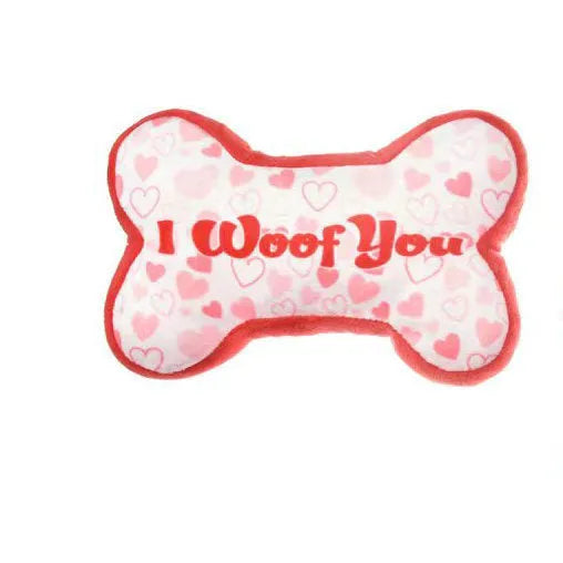 Plush dental toy for dogs with bite-resistant construction and vocalisation sounds in four colour options