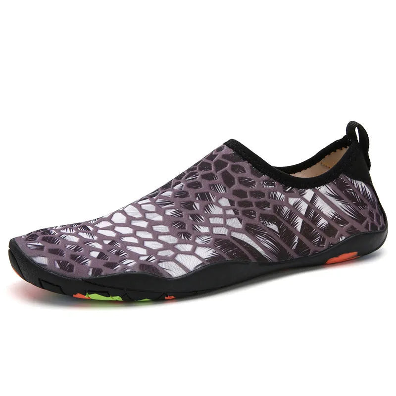 Blue Lycra beach wading shoes with elastic upper and lightweight EVA sole for swimming.