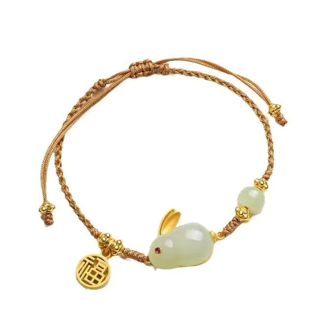 Hetian jade rabbit charm bracelet for women on a yellow string fastening