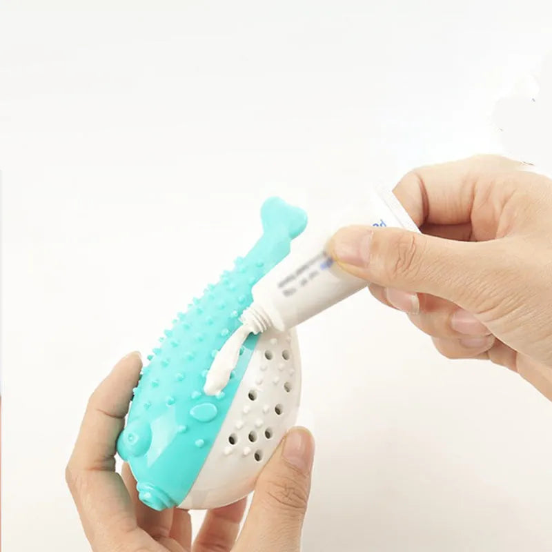 Silicone fish-shaped cat chew toy with grabbing feature in blue, green, pink or yellow options
