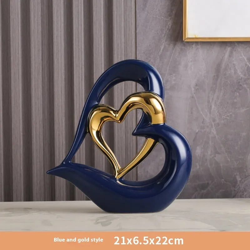 Modern white porcelain love heart ornament with a choice of metallic gold, silver and coloured finishes.