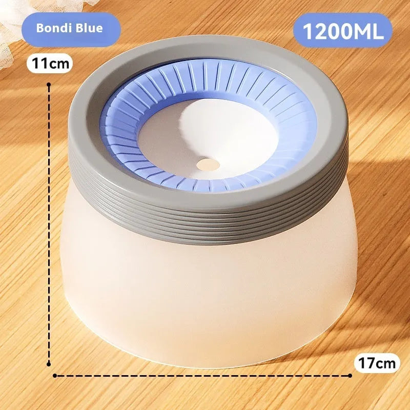 Green, blue, and brown pet suspension drinking bowl with separate base plate on a white background.