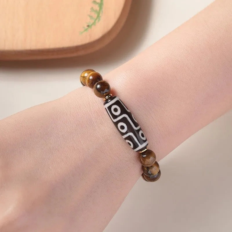 Ethnic style single circle beaded Buddha rosary bracelet shown in different bead sizes on a wrist.