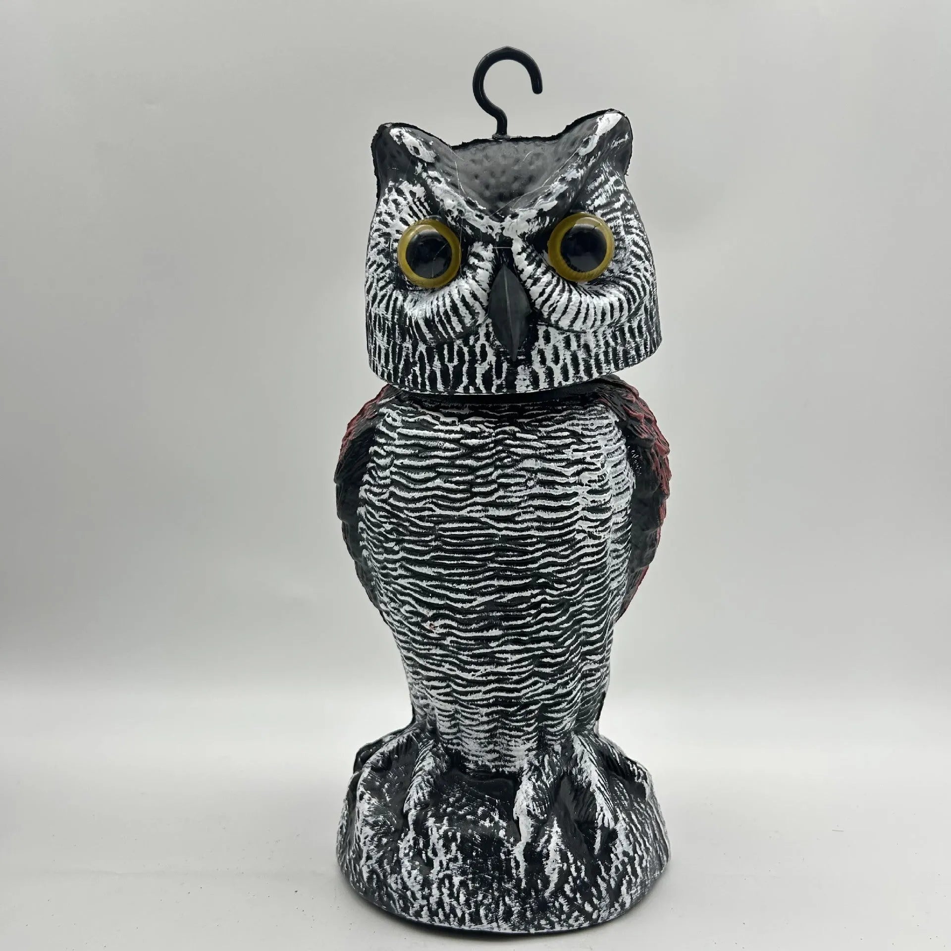 Realistic plastic artificial owl bird deterrent ornament with shaking head, for outdoor use.