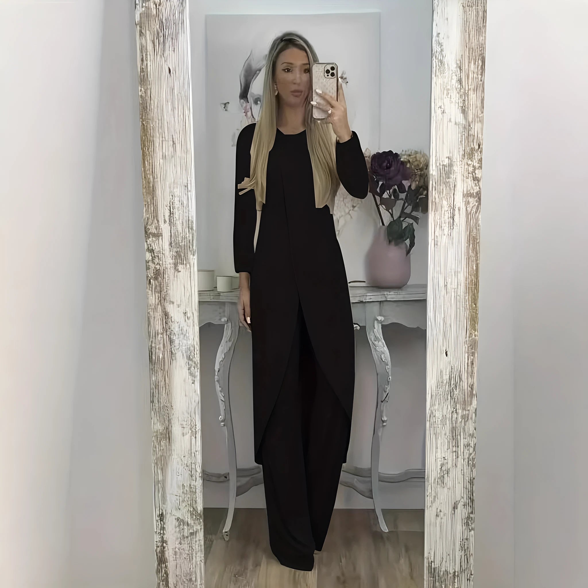 Women's long sleeve round neck shirt and trousers two-piece casual set in black.