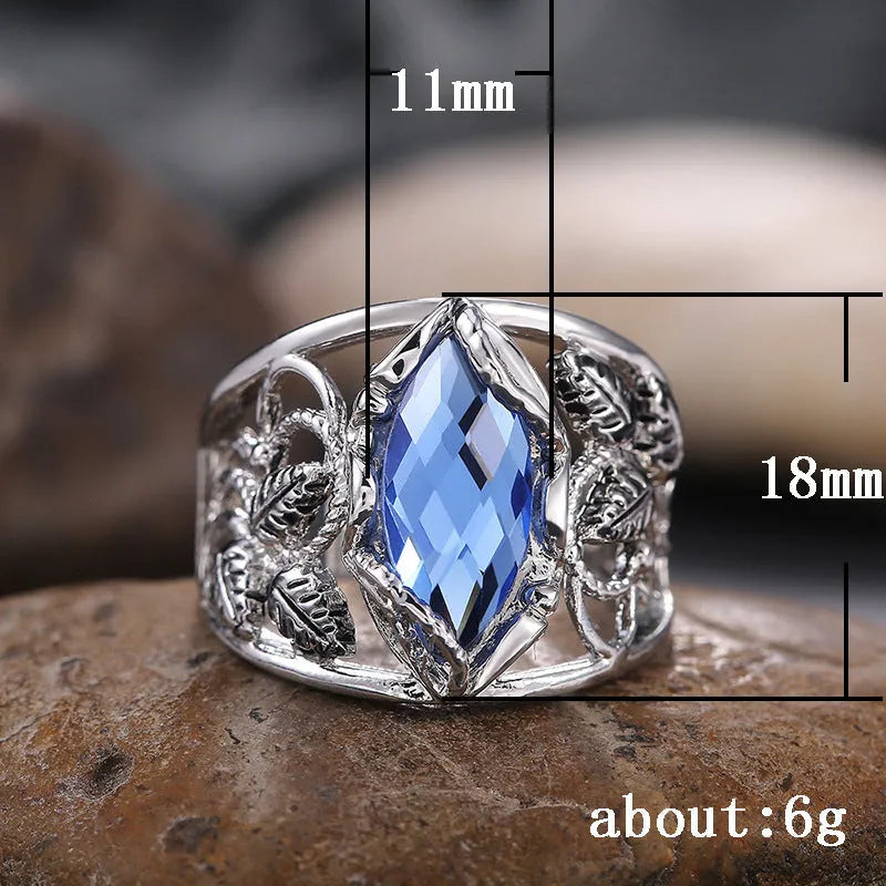 Blue horse eye geometric alloy women's ring with crystal inlay detailing showing side profile