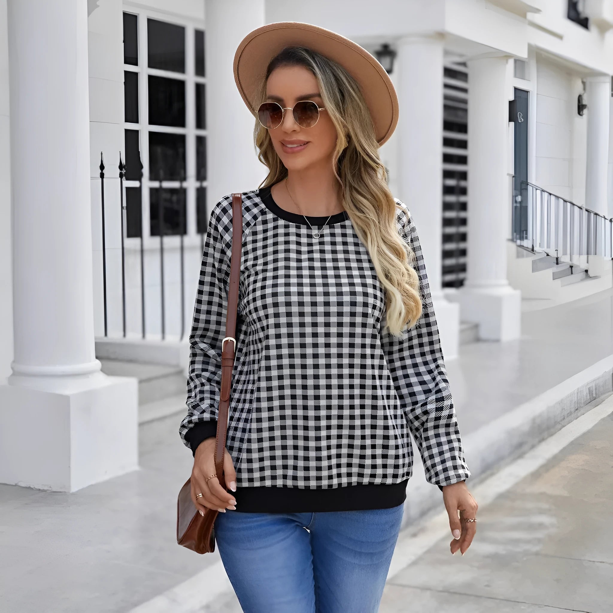 Black long sleeve polyester sweater with striped plaid print pattern