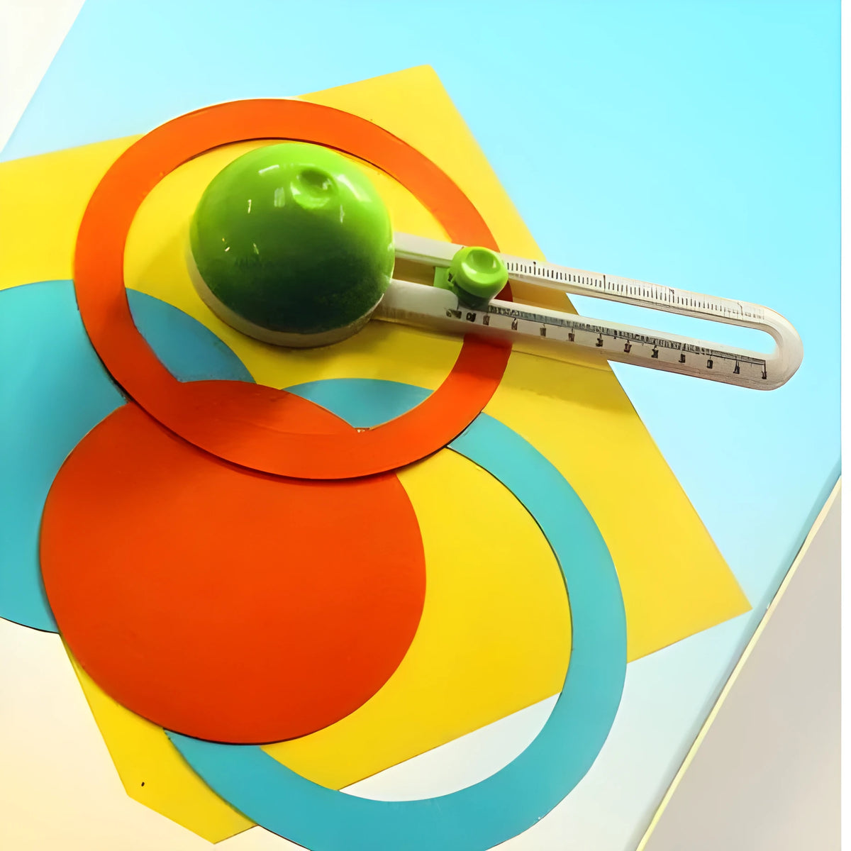 Round plastic paper cutter for A3 documents in orange or green colour options