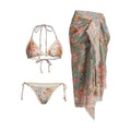 Women's creamy-white floral print bikini set with matching skirt for beach use