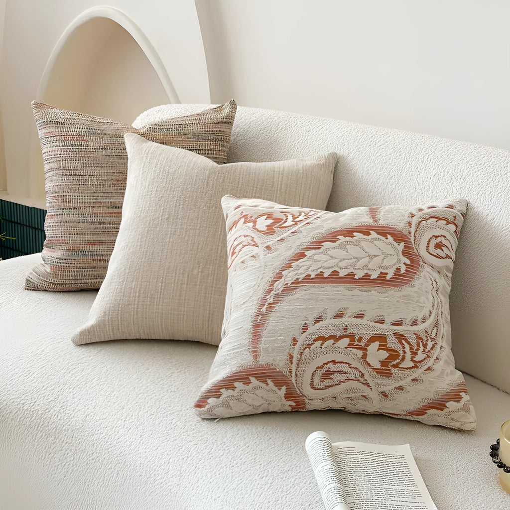American-style jacquard throw pillow cover with paisley pattern in amber tones, shown in square and rectangular sizes.