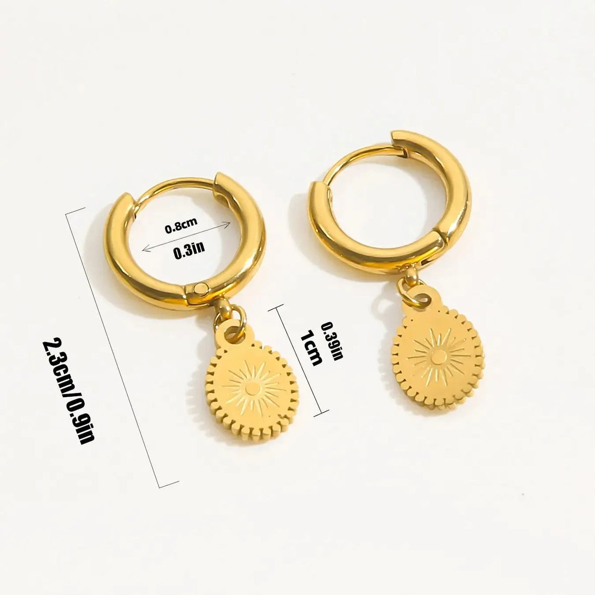 Stainless steel geometric earrings with oval accents on white background