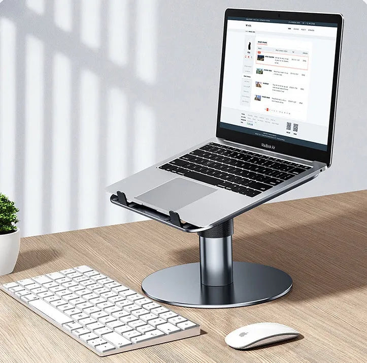 Silver aluminium car laptop stand with height adjustment and rotating base on a car seat