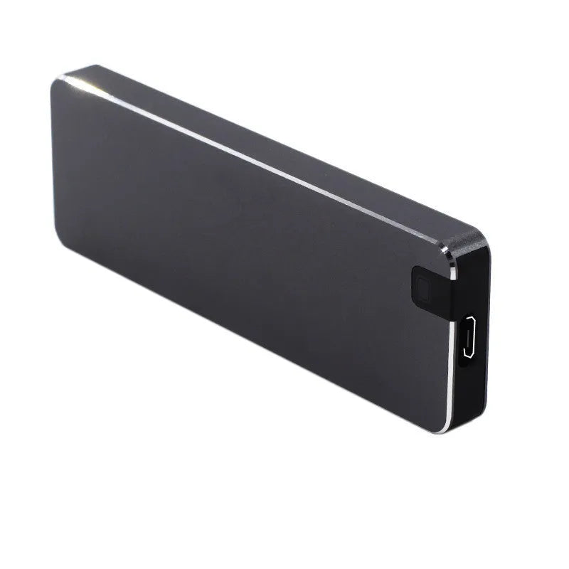 White metal-shell mobile solid state drive with USB 3.1 cable on packaging