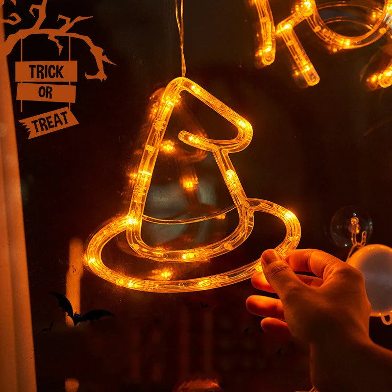 Halloween window hanging LED lights with spider pumpkin ghost designs and suction cup attachment