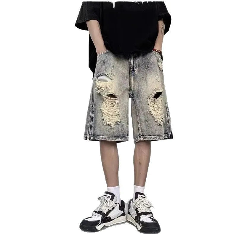 Blue retro-style denim shorts with a wide-leg, loose fit on a person.